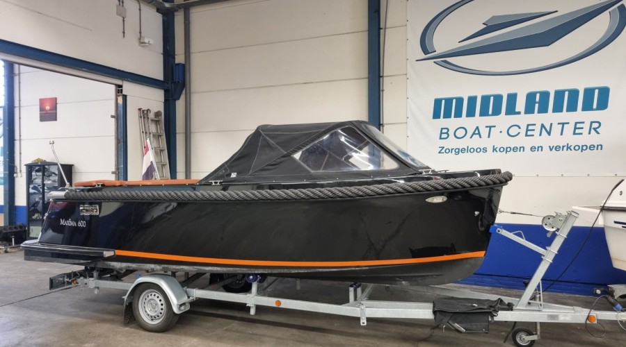 Schitterende en z&eacute;&eacute;r complete Maxima 600 Orange Edition